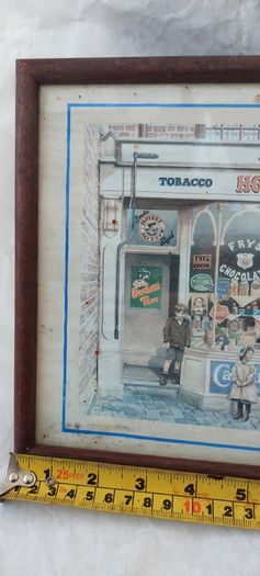 Old advertising shop front picture print ,different brands for sale, in the shop,nice for any home bar or man cave pub restaurant etc,,buyer collects thank you,, rather buyer collects with the glass ,sold as is ,,see pictures for condition