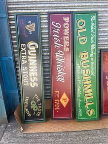 Painted wooden sign.  Jameson, Guinness etc