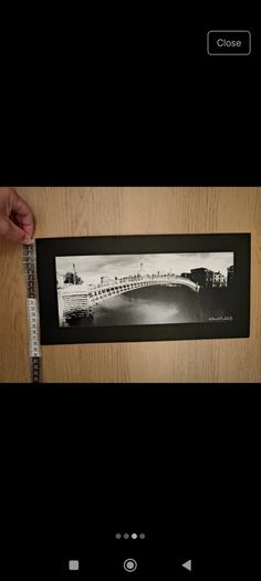 Standing A penny bridge Dublin painting - Photos by Neil Armstrong Jude