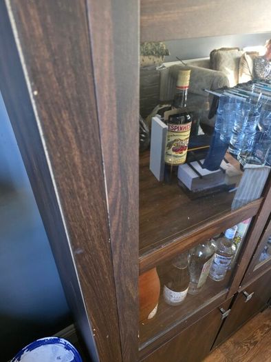 Dark wood glass cabinet