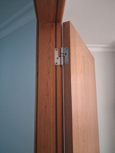 Oak Doors, solid oak frames, architrave and skirting.