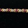 9ct yellow gold diamond and ruby bracelet Image 9