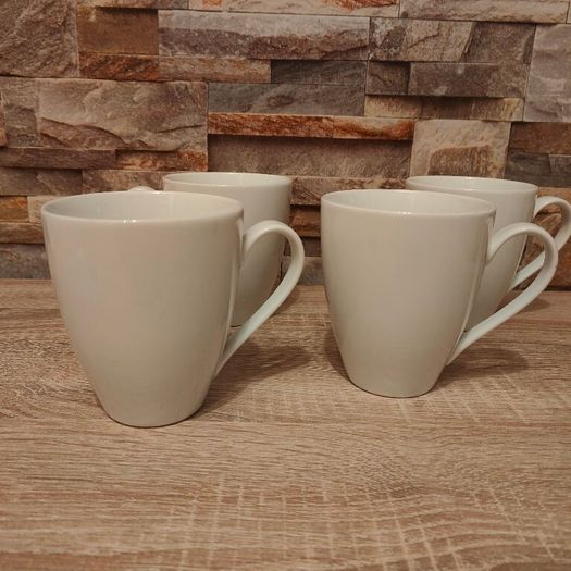 Four white mugs