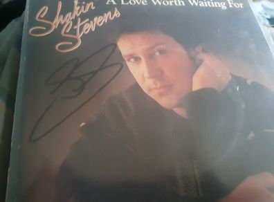 record signed shakin Stevens