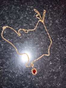 9ct gold necklace with ruby and diamond pendant