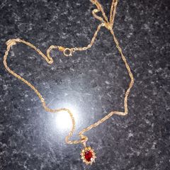 9ct gold necklace with ruby and diamond pendant