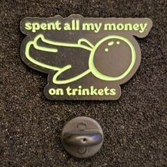 Spent all my money,  pin back badge.