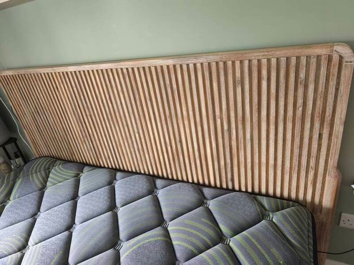 Super King mattress with wooden bed