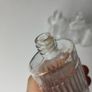 308 - Set of 4 Vintage Decorative Ribbed Collectible Clear Glass Bottles Image 3