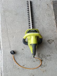 hedge trimmer ryobi with WD-40 garden lubricant (with short lead)