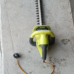 hedge trimmer ryobi with WD-40 garden lubricant (with short lead)