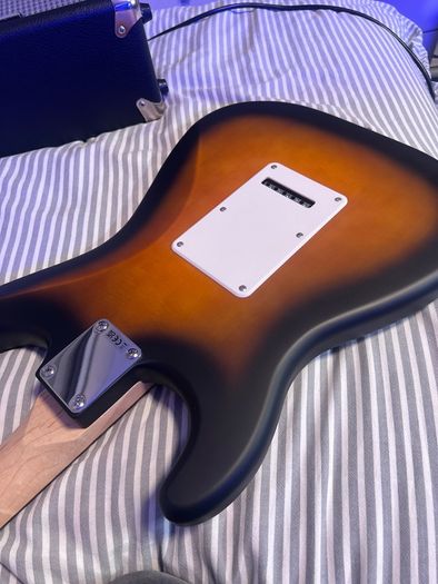 squire by fender debut Stratocaster in 2 tone sun burst with fender amp