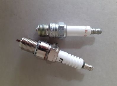 Spark plugs for ride on mower Long and short.