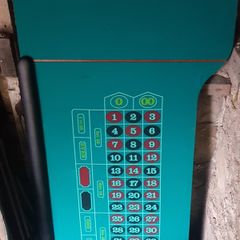 Roulette Table. Wheel and Chips