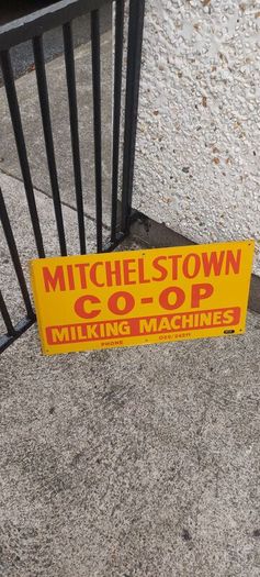 Mitchelstown hay barn advertising,sign by currans of Clonmel,,original ,came out of the offices in mitchelstown branch ,,,few marks  ,lovely advertising display item, for any garage ,man cave or personal collection, sold as is