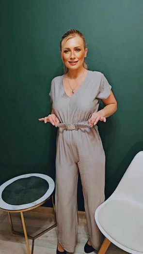 Jumpsuit with a decorative belt and tied back