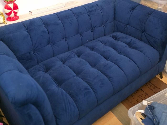 Blue velvet sofa