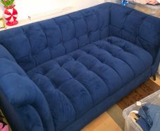 Blue velvet sofa
