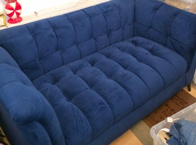 Blue velvet sofa