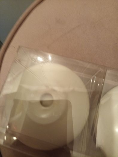 Four ceramic T light holders