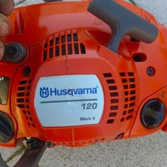 Husqvarna 120 Mark II chain saw in excellent working condition which starts half pull.