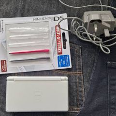 Nintendo DS Lite and 12 games, Crash Bandicoot, Mario, Zelda