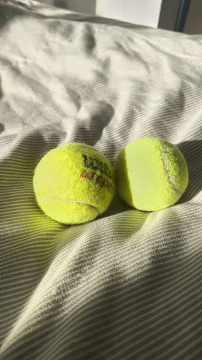 Pair of Tennis Balls (1x Wilson US Open + 1x Unbranded)