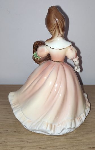 Vintage Porcelain Girl with flower basket Figurine
