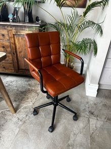 Faux leather light brown swivel chair