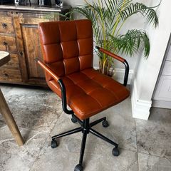 Faux leather light brown swivel chair