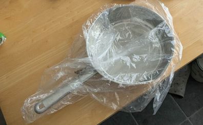 Set of two pots, one frying pan and strainer for sale brand new