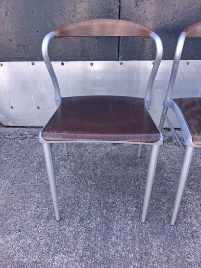 Pair of Piuma occasional chairs designed by Origlia
