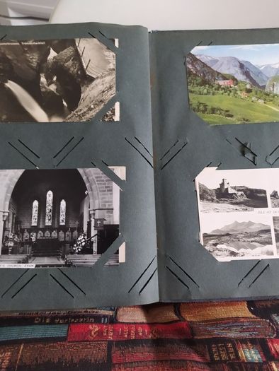 Old postcard album with 80 cards from 1914 to 1955,plus 10 miniature photos of New York,5 old John Hinde,postcards,3 old Iraqui postcards