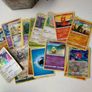 Pokemon Tin with 20 Pokemon Cards Image 3
