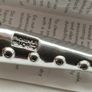 A collectible knife made of polished pewter with a stainless steel blade from Carrol Boyes. Image 8