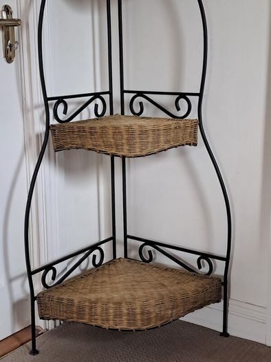 Wrought iron and wicker corner shelf unit