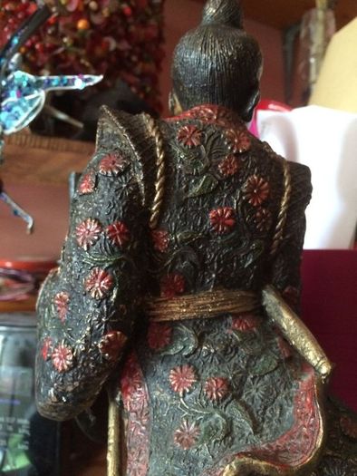 A fine bronze of a samurai signed  MIYAO
