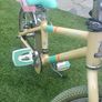 Raleigh Pop 16-inch Kids' Bike in the Cream/Teal Image 4