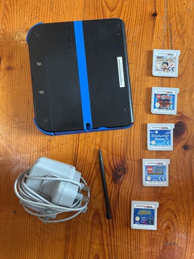 Nintendo 2DS with games and charger