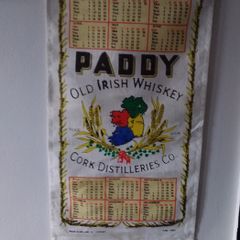 Vintage Cork Distilleries Co. " Paddy Old Irish Whiskey ", 1988 Wall Hanging Calender