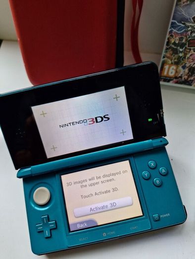 Aqua Blue Nintendo 3DS with games