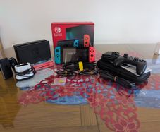 Near perfect Nintendo Switch beginner Bundle + 3 Games, Pro Controller and extra storage