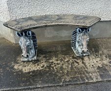 Stone garden bench horses