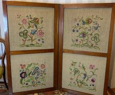 Edwardian mahogany-framed room divider screen with embroidered panels.