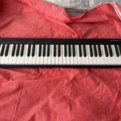 Nektar Impact GX61 keyboard midi controller