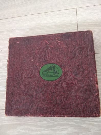 Antique book with 12 his master voice records