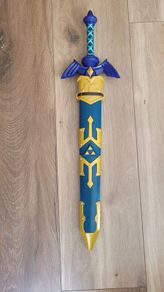 Legend of Zelda toy sword and cover