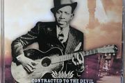 Robert Johnson. Contracted To The Devil.