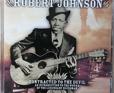 Robert Johnson. Contracted To The Devil.