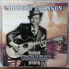 Robert Johnson. Contracted To The Devil.